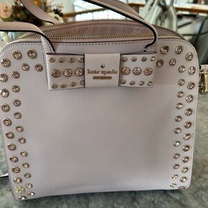 Pink rhinestone embellished Kate Spade handbag.